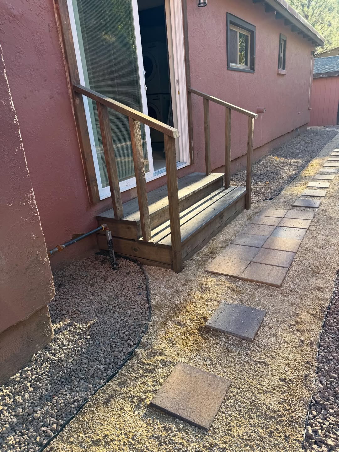 Wooden deck and landscaping project by JTEX Construction