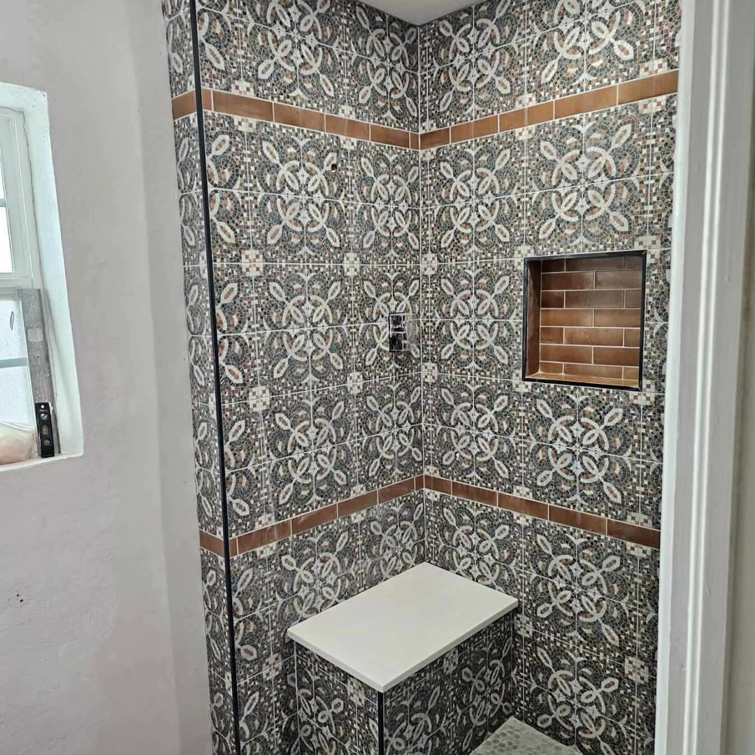 Custom tile shower renovation by JTEX Construction