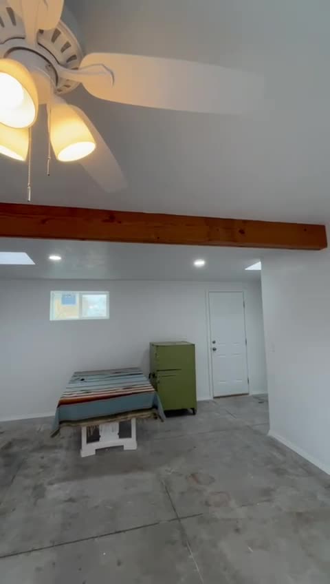 Interior renovation with exposed beam ceiling by JTEX Construction
